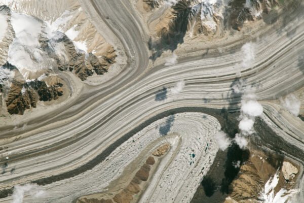 Trio of stripy glaciers merging in ‘Earth’s highest battleground’ are part of a major anomaly scientists don’t fully understand — Earth from space